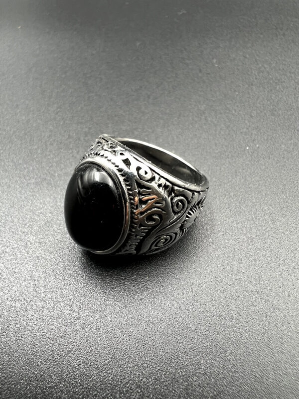 Silver oval ring with black stone